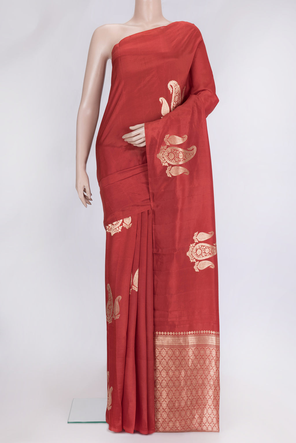 Red Dual Tone Tussar Silk Saree with Zari Butta on the body and Without Border.  displayed on a mannequin