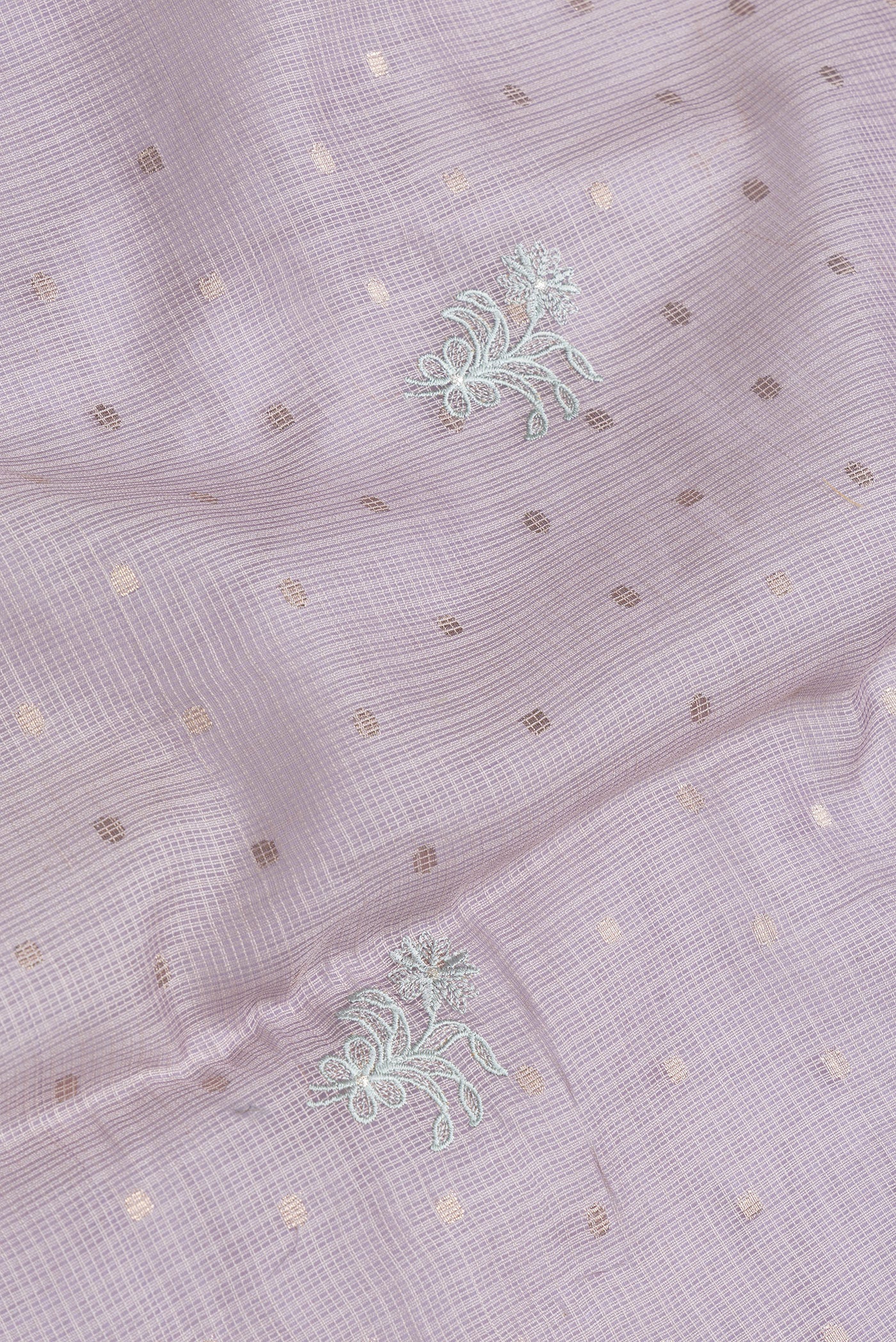 Close up of Lavender Dual Tone Kota Silk Saree with Embroidery on the body and Without Border.  displaying folds