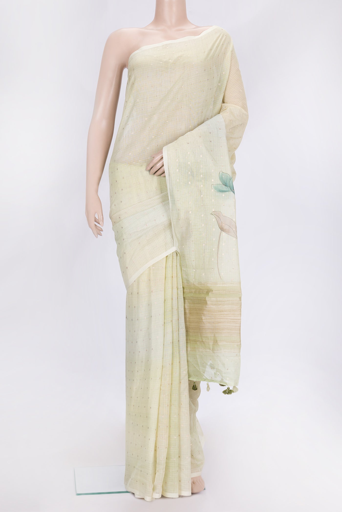 Pista Green Dual Tone Kota Silk Saree with Zari Butta on the body and Without Border.  displayed on a mannequin