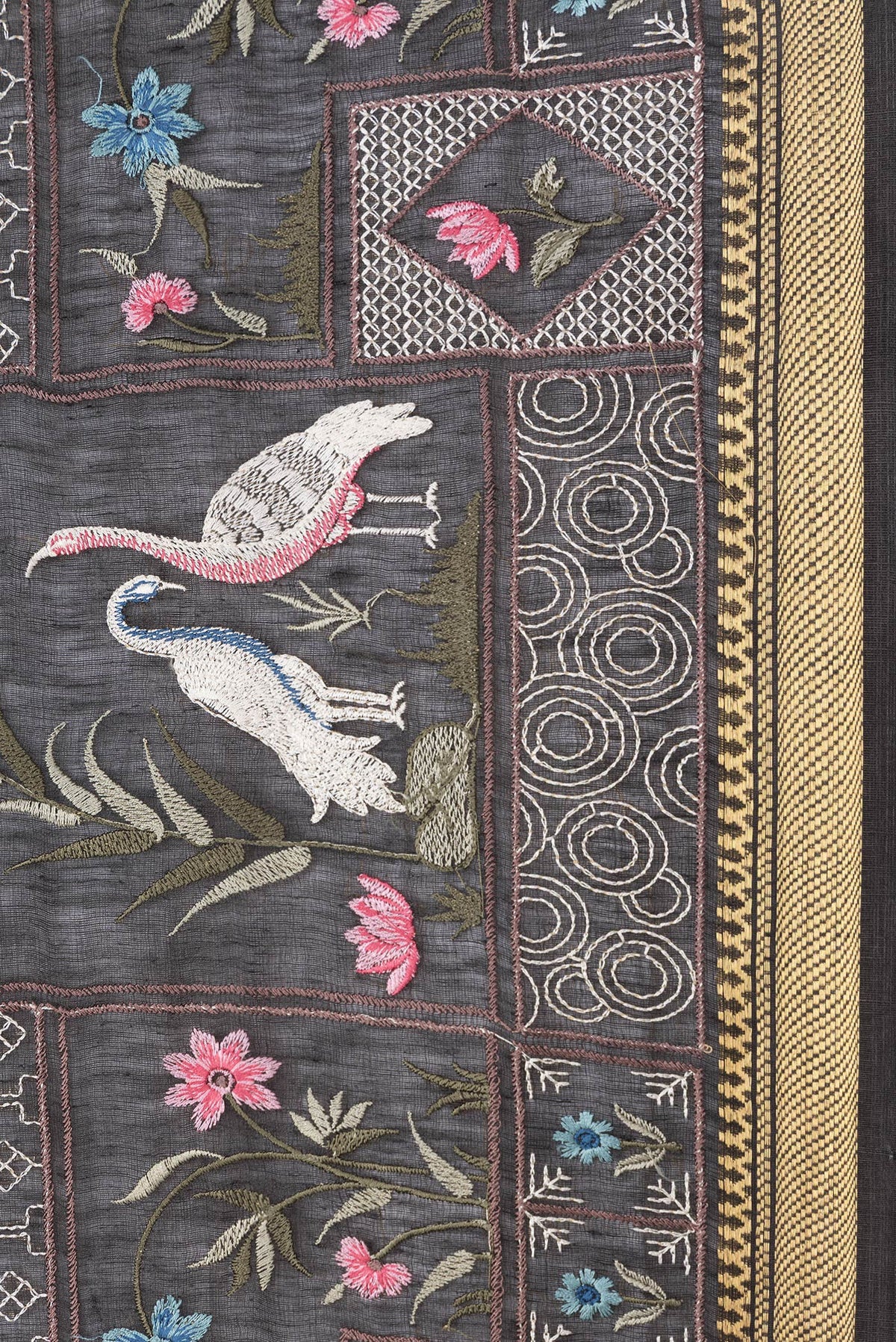Border image of Black Dual Tone Linen Saree with Embroidery on the body and Zari Border. 