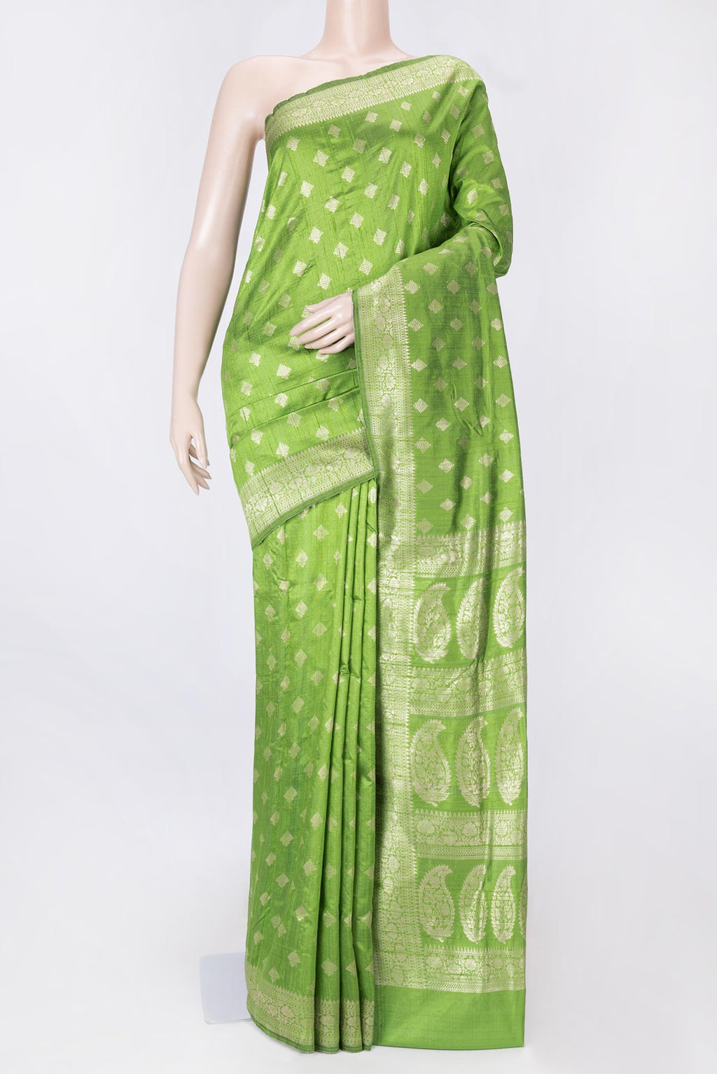 Parrot Green Dual Tone Raw Silk Saree with Zari Brocade on the body and Zari Border displayed on a mannequin