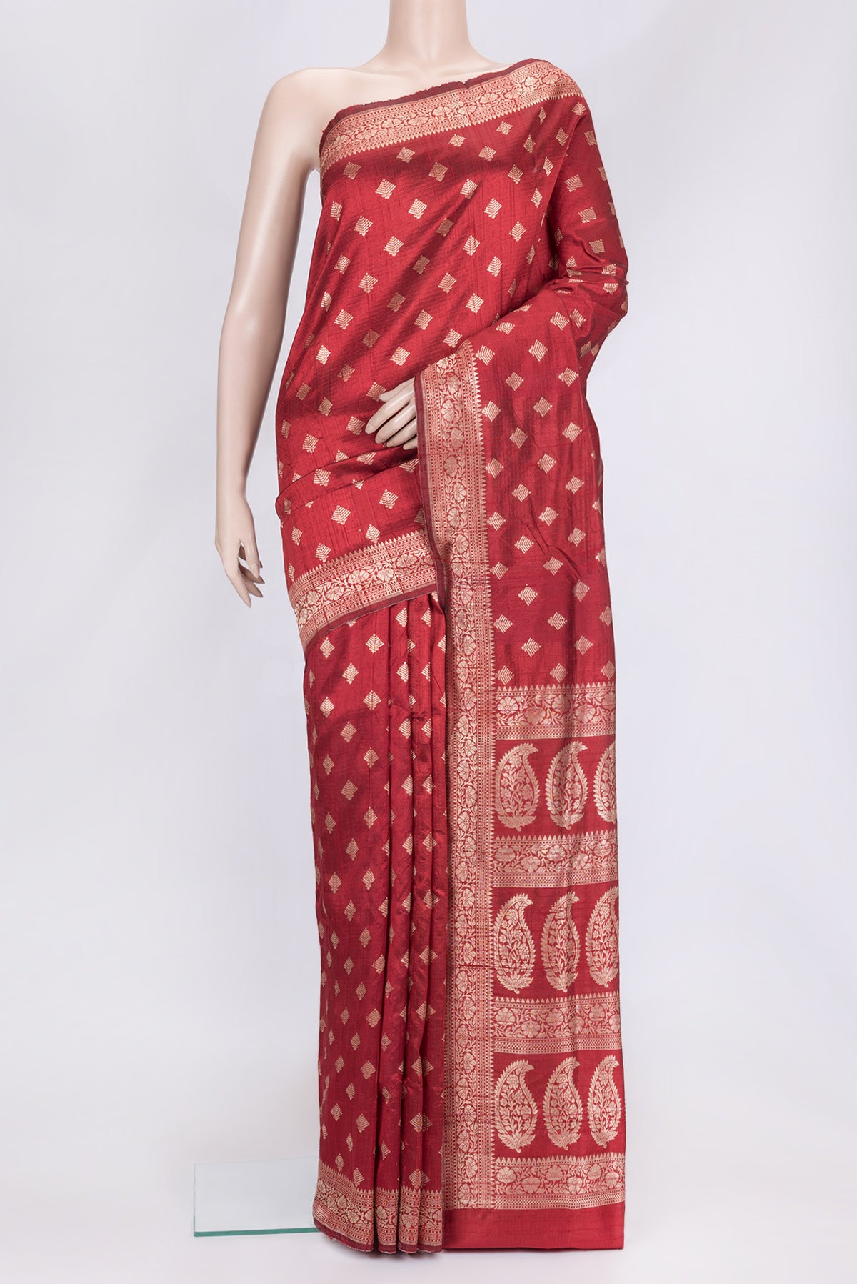 Maroon Dual Tone Raw Silk Saree with Zari Butta on the body and Zari Border.  displayed on a mannequin