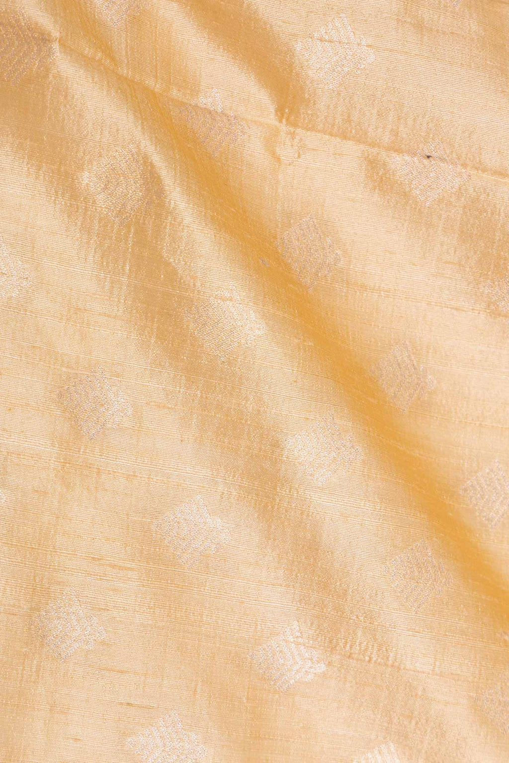 Close up of Sandal Dual Tone Raw Silk Saree with Zari Brocade on the body and Zari Border displaying folds