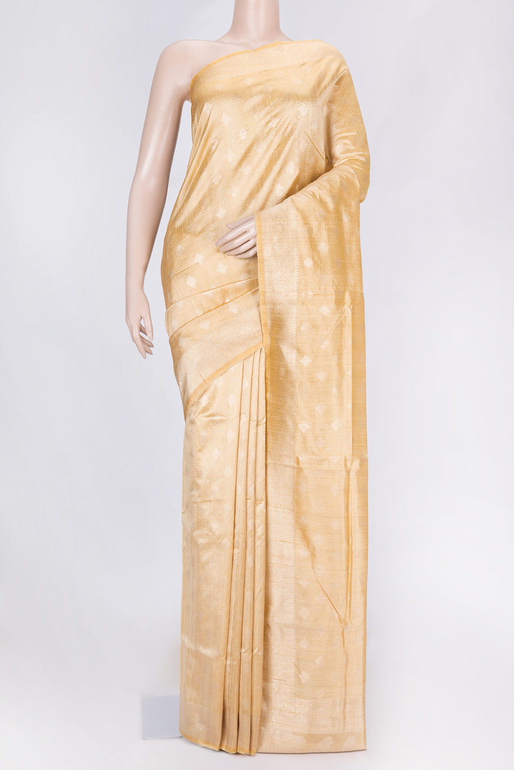 Sandal Dual Tone Raw Silk Saree with Zari Brocade on the body and Zari Border displayed on a mannequin