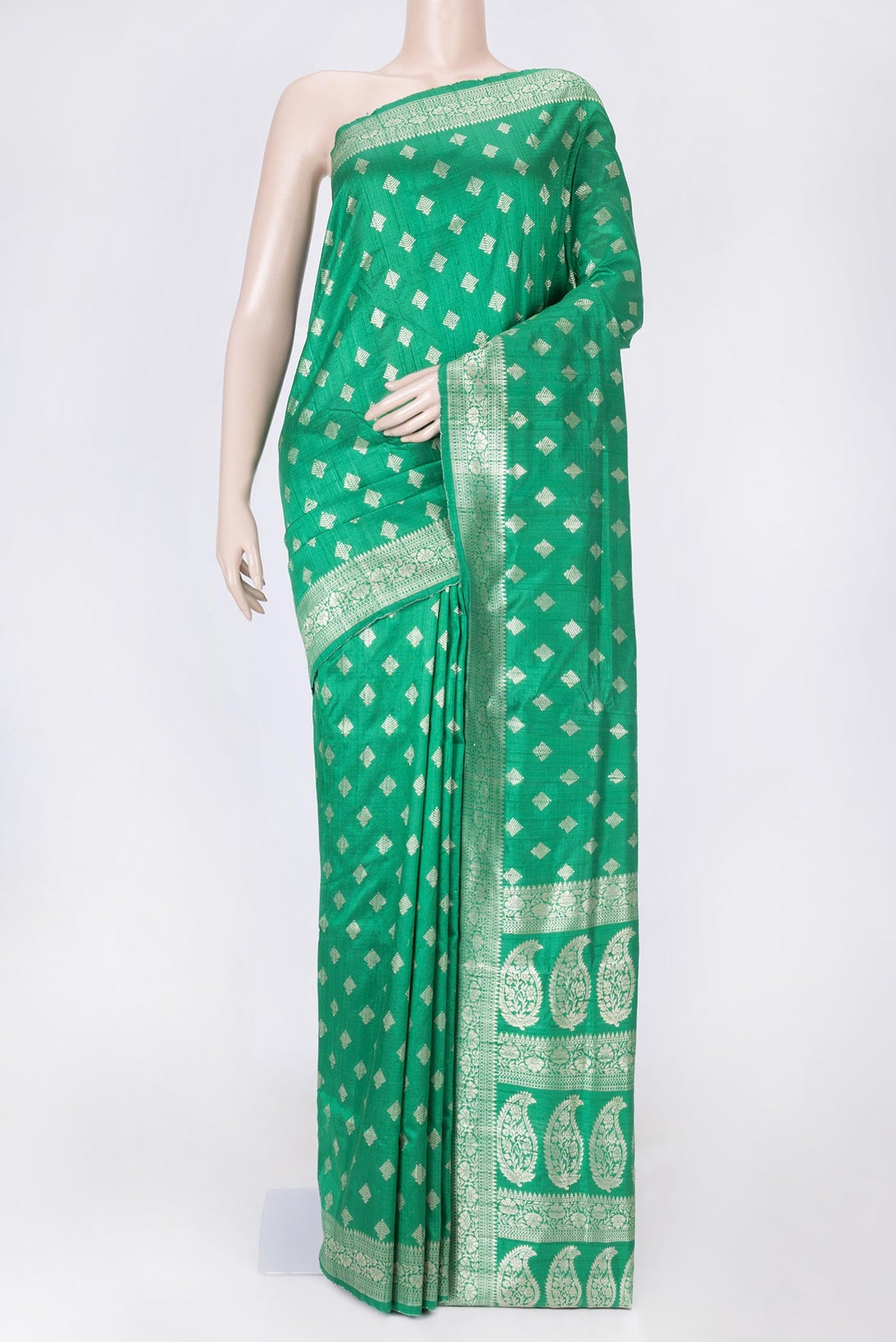 Green Dual Tone Raw Silk Saree with Zari Brocade on the body and Zari Border displayed on a mannequin