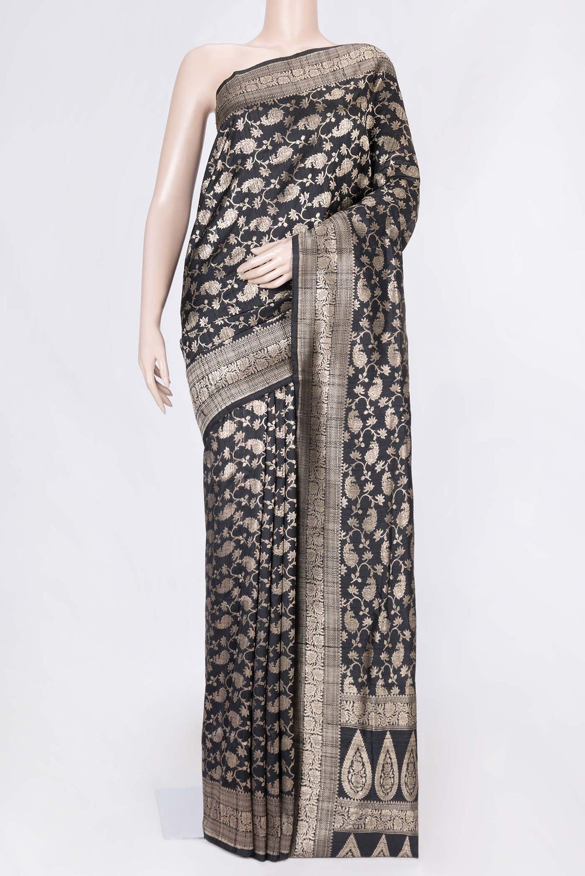 Black Dual Tone Raw Silk Saree with Zari Brocade on the body and Zari Border displayed on a mannequin