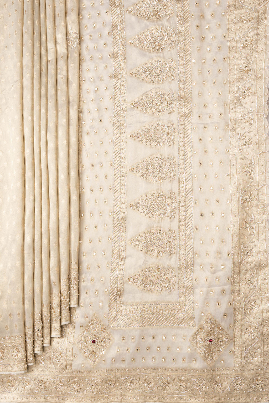 Pleats and pallu of Gold Dual Tone Banarasi Georgette Saree with Zari Brocade on the body and Embroidery Border. 