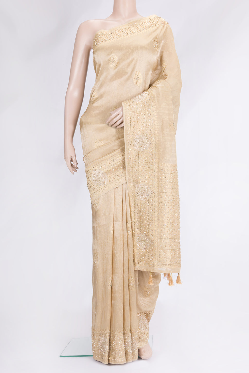 Beige Dual Tone Banarasi Georgette Saree with Embroidery on the body and Embroidery Border.  displayed on a mannequin