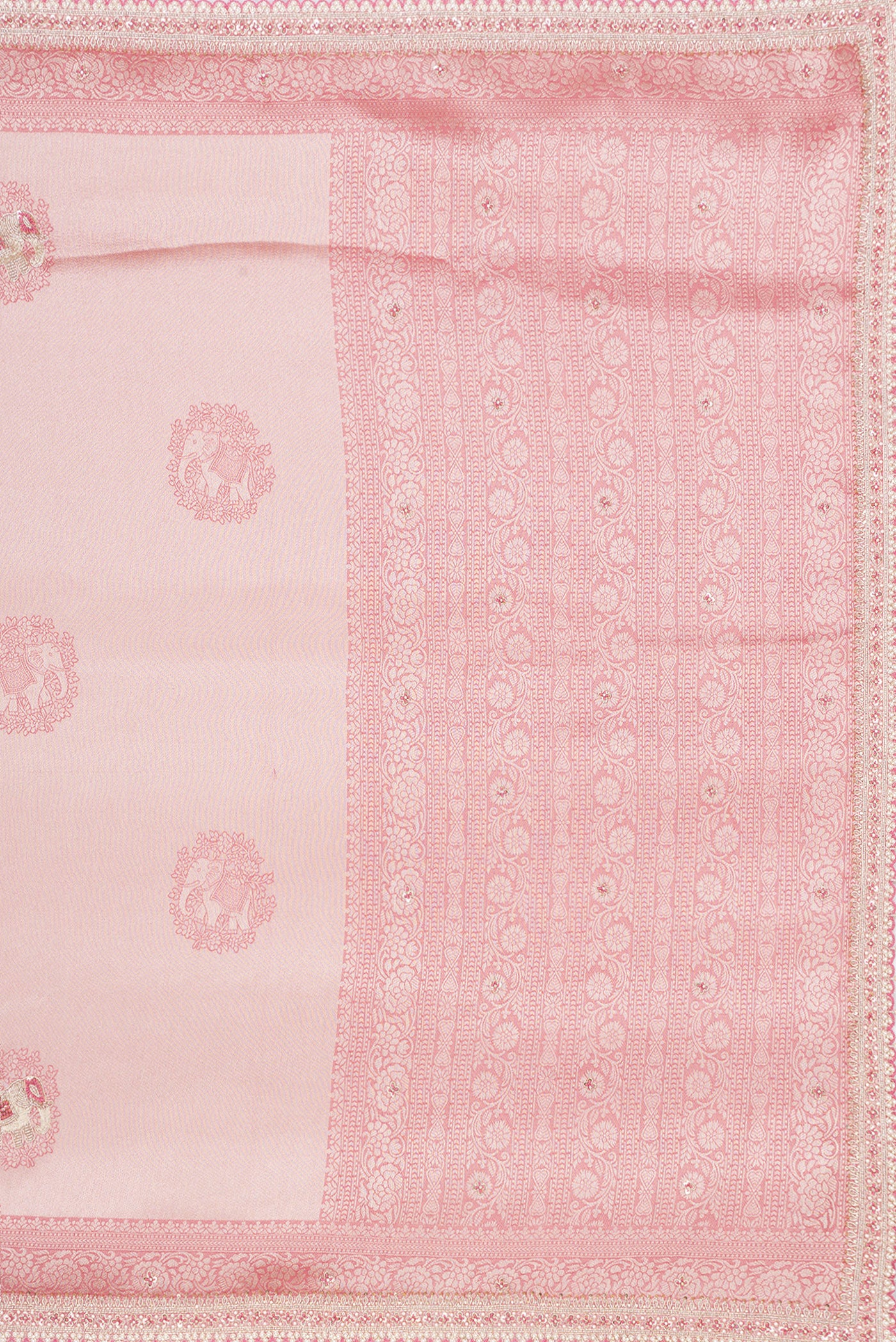 Close up image of the pallu of Rose Gold Dual Tone Banarasi Georgette Saree with Embroidery on the body and Embroidery Border. 