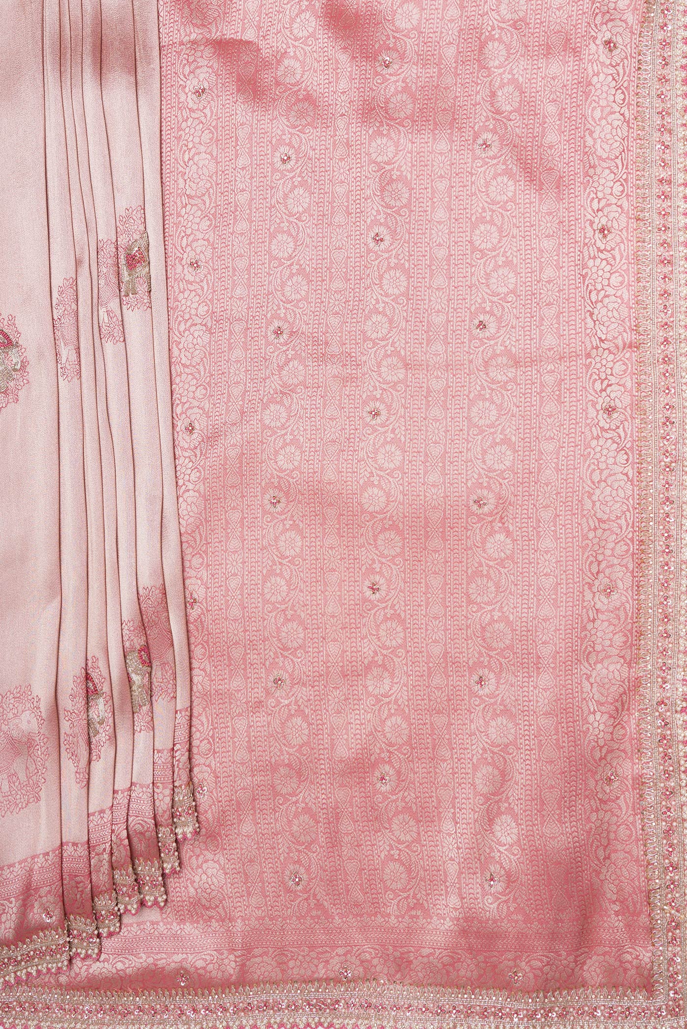 Pleats and pallu of Rose Gold Dual Tone Banarasi Georgette Saree with Embroidery on the body and Embroidery Border. 