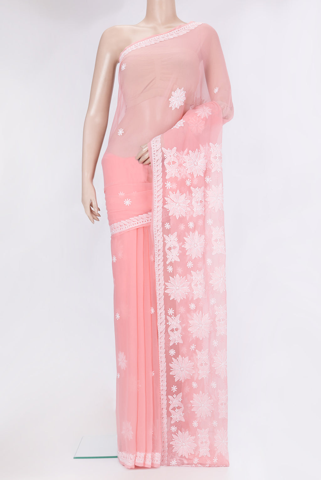 Rose pink Georgette Saree with Embroidery on the body and Embroidery Border.  displayed on a mannequin