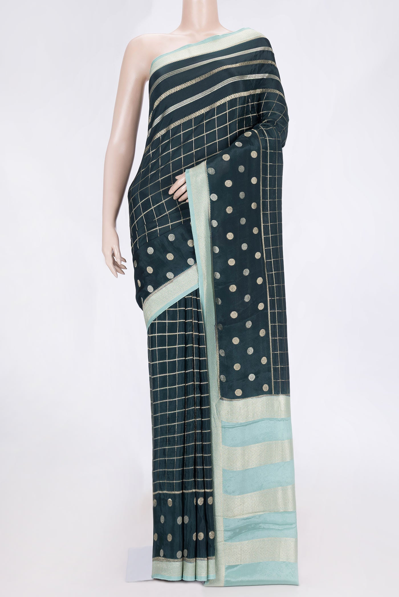 Bottle Green Dual Tone Banarasi Silk Saree with Checked design on the body and Fancy Border.  displayed on a mannequin