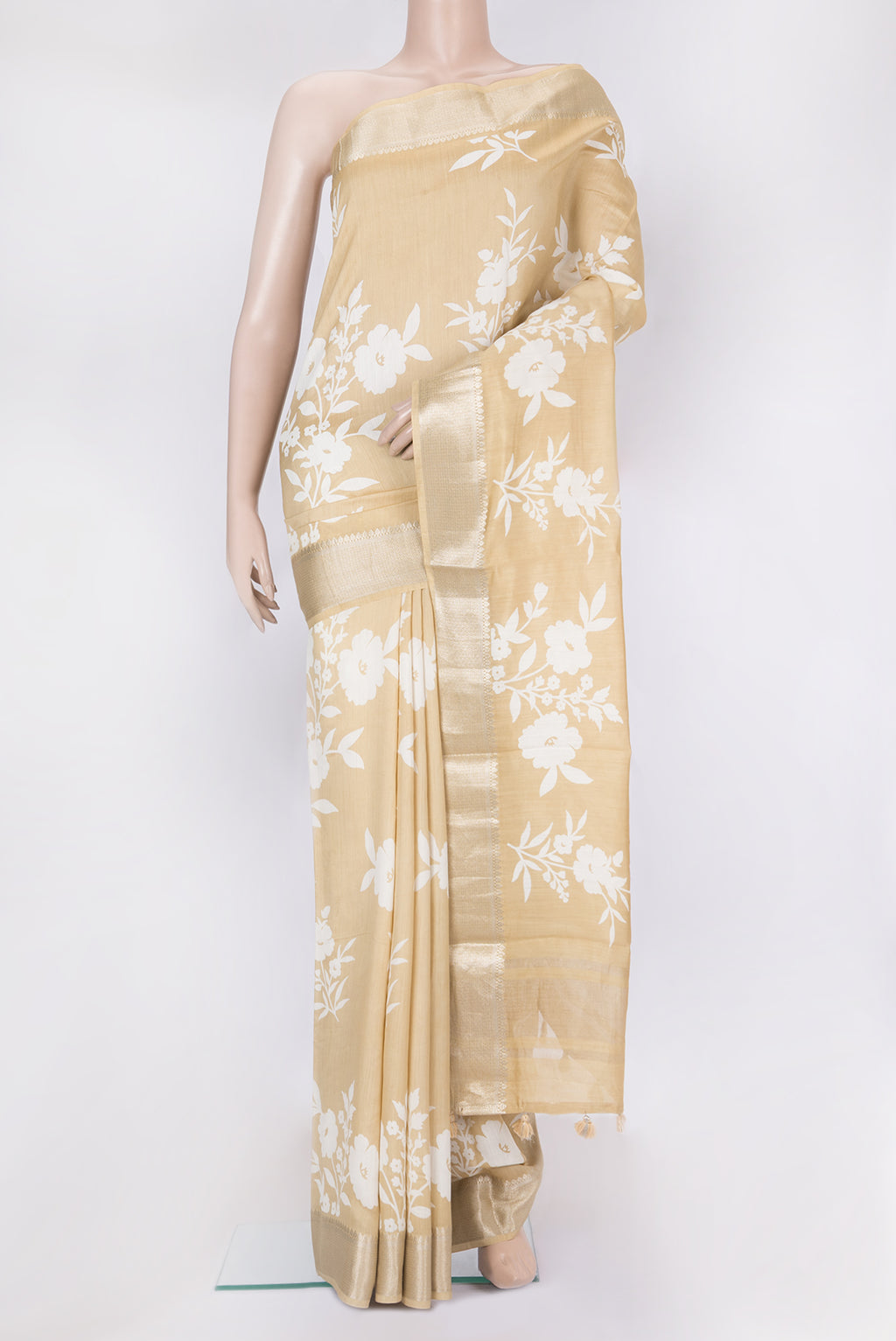 Sandal Chanderi Silk Saree with Printed design on the body and Zari Border.  displayed on a mannequin
