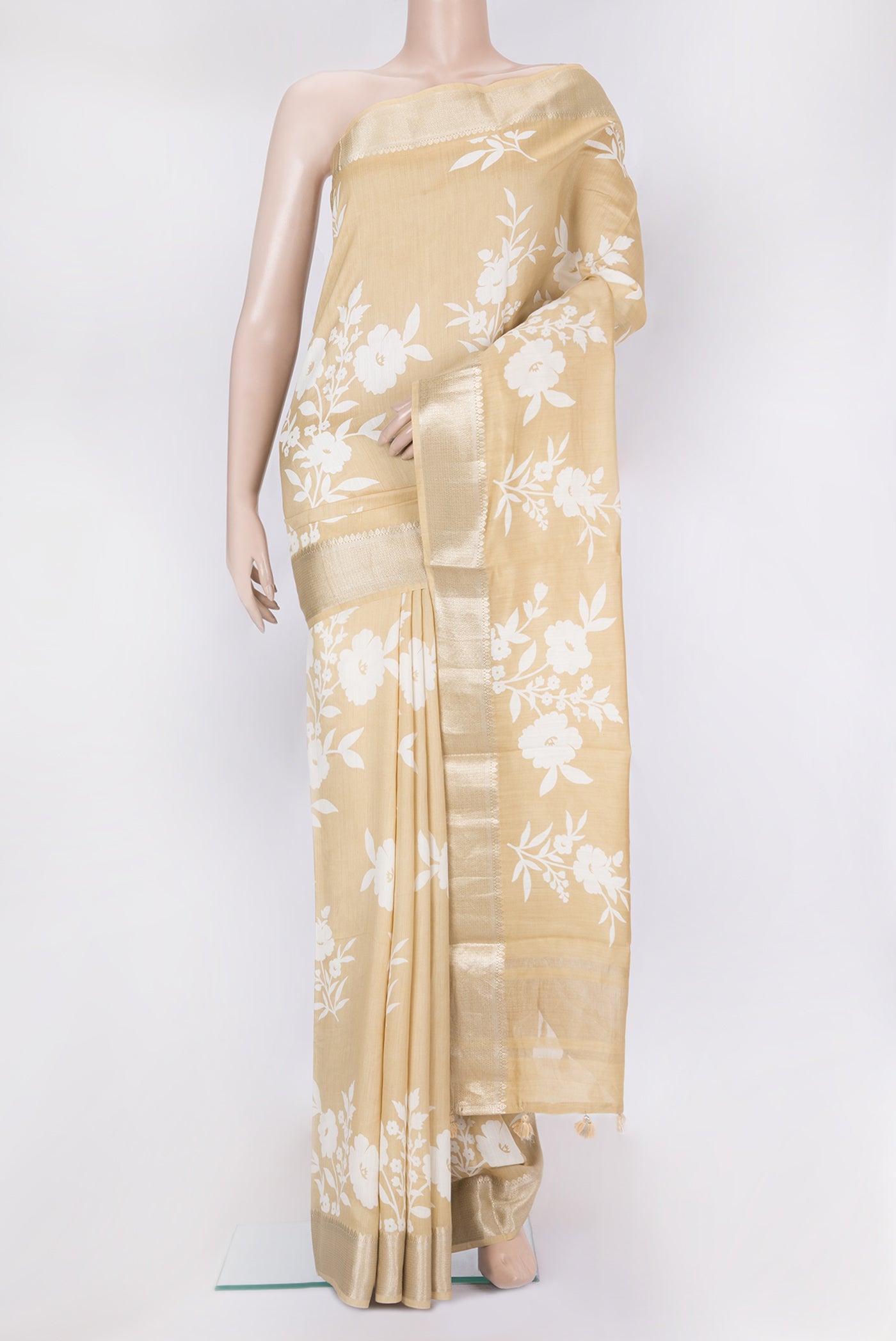 Sandal Chanderi Silk Saree with Printed design on the body and Zari Border.  displayed on a mannequin