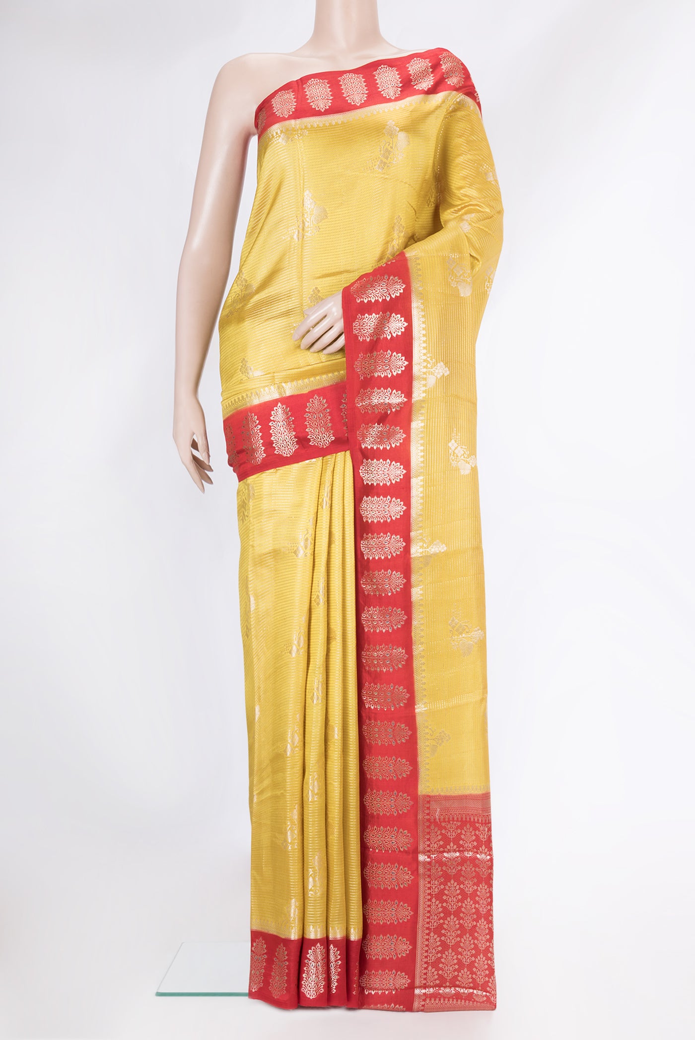 Yellow Dual Tone Tussar Silk Saree with Zari Brocade on the body and Fancy Border.  displayed on a mannequin