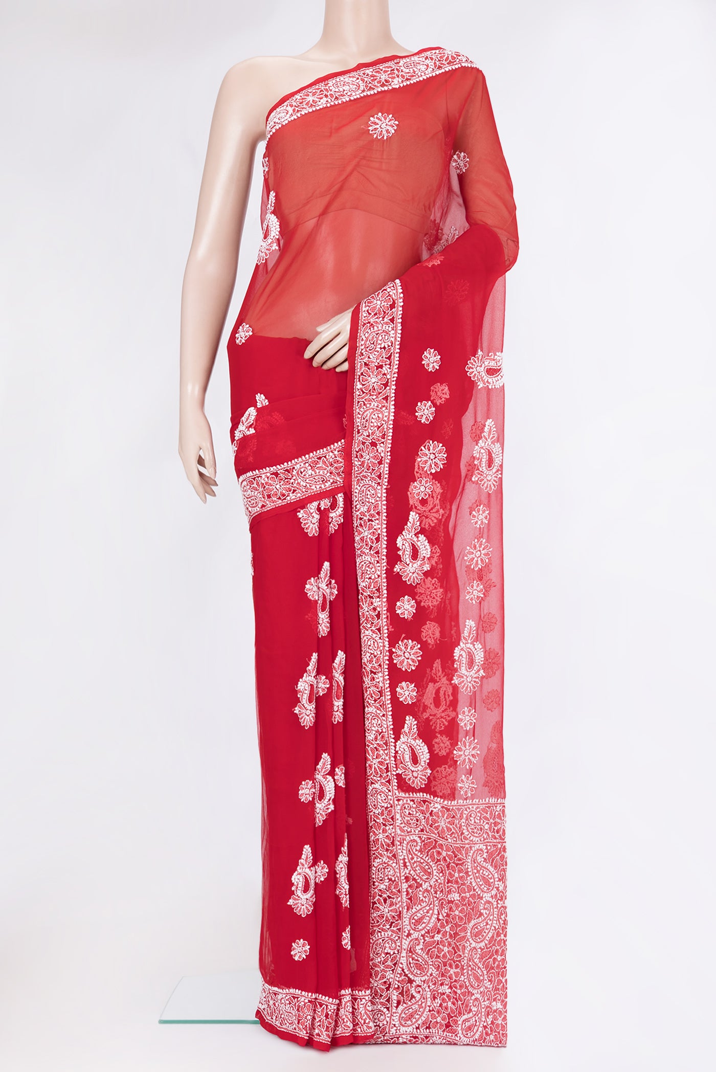 Red Georgette Saree with Embroidery on the body and Embroidery Border.  displayed on a mannequin