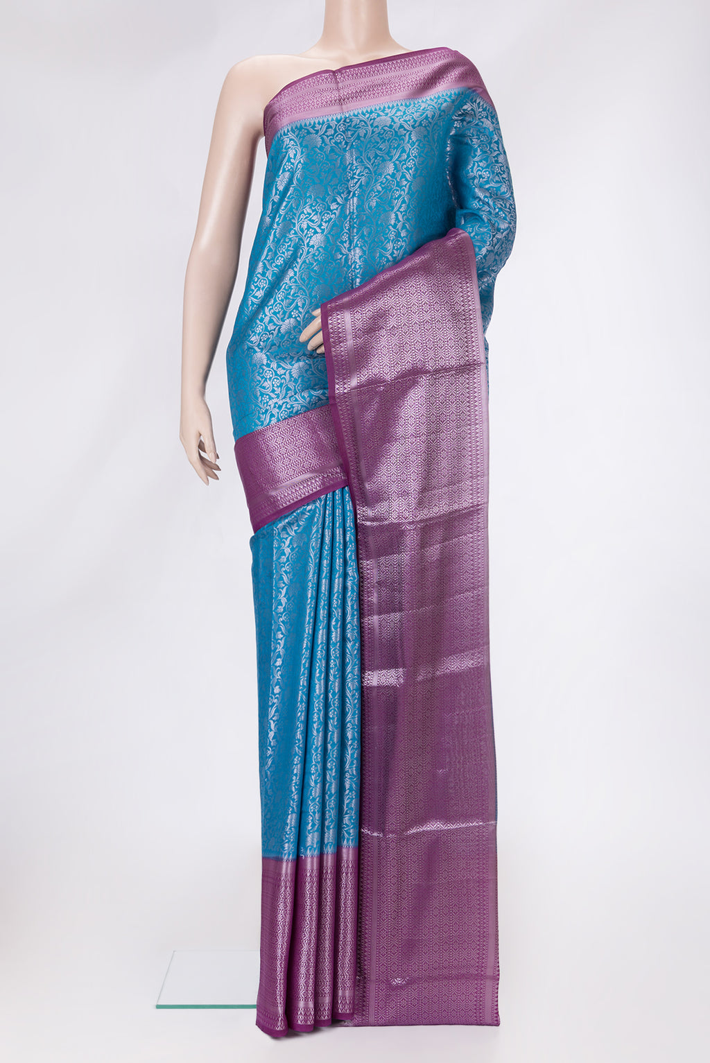 Sky Blue Dual Tone Tussar Silk Saree with Zari Brocade on the body and Zari Border.  displayed on a mannequin