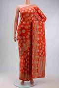Orange Banarasi Silk Saree with Zari Butta on the body and Zari Border displayed on a mannequin