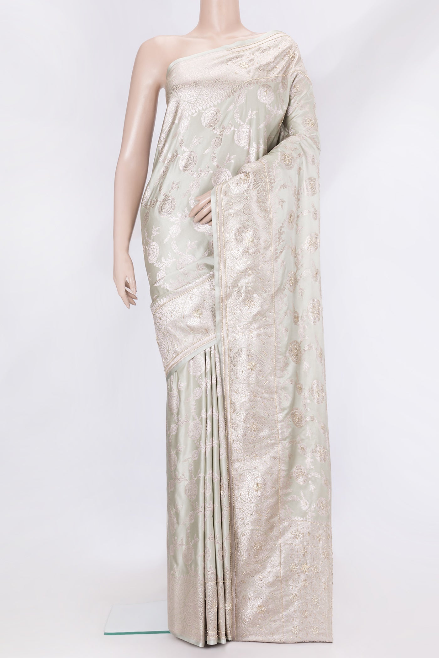 Grey Dual Tone Banarasi Silk Saree with Embroidery on the body and Embroidery Border.  displayed on a mannequin