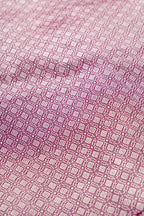 Close up blouse image of Burgundy Banarasi Silk Womens Lehenga set featuring Zari Brocade Choli paired with Burgundy Zari Brocade Skirt with Zari Border and a Zari Butta dupatta in Burgundy