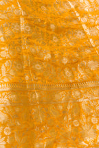 Detailed shot of Mustard Banarasi Silk Womens Lehenga set featuring Zari Brocade Choli paired with Mustard Zari Brocade Skirt with Zari Border and a Zari Brocade dupatta in Mustard
