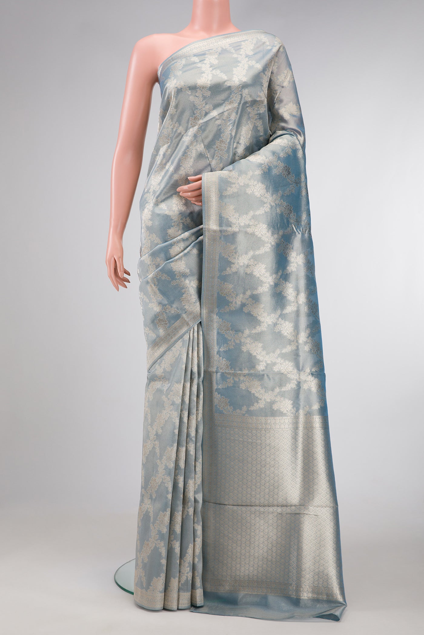 Maya Blue Dual Tone Organza Silk Saree with Zari Brocade on the body and Zari Border.  displayed on a mannequin