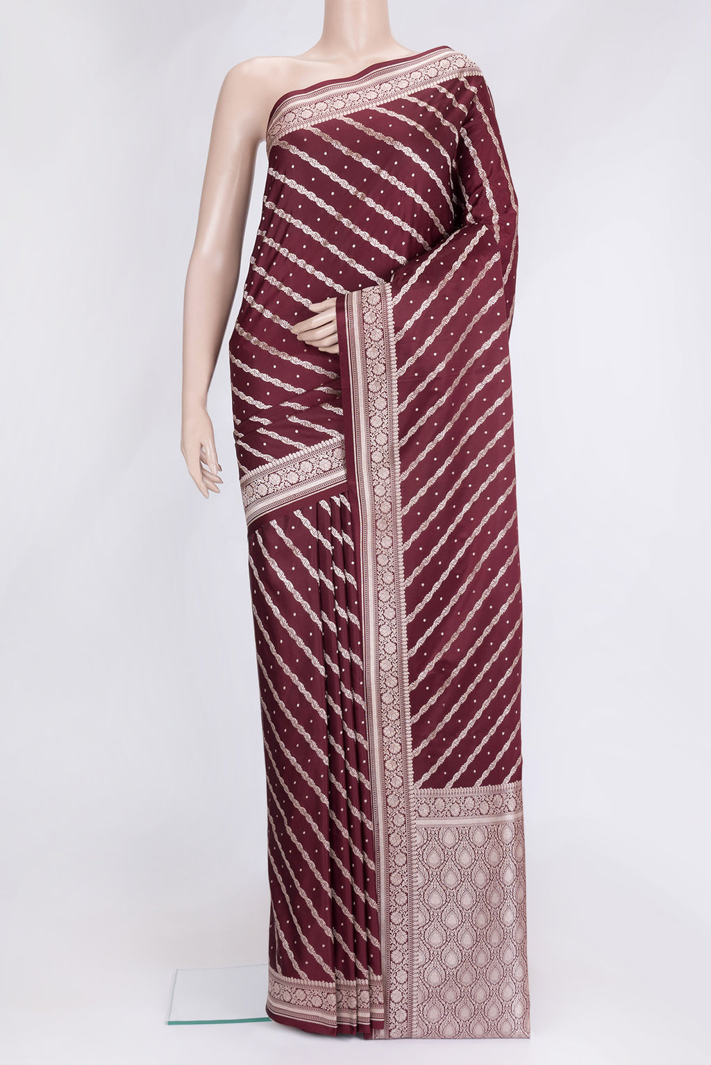Maroon Dual Tone Blended Banarasi Silk Saree with Zari Brocade on the body and Zari Border.  displayed on a mannequin