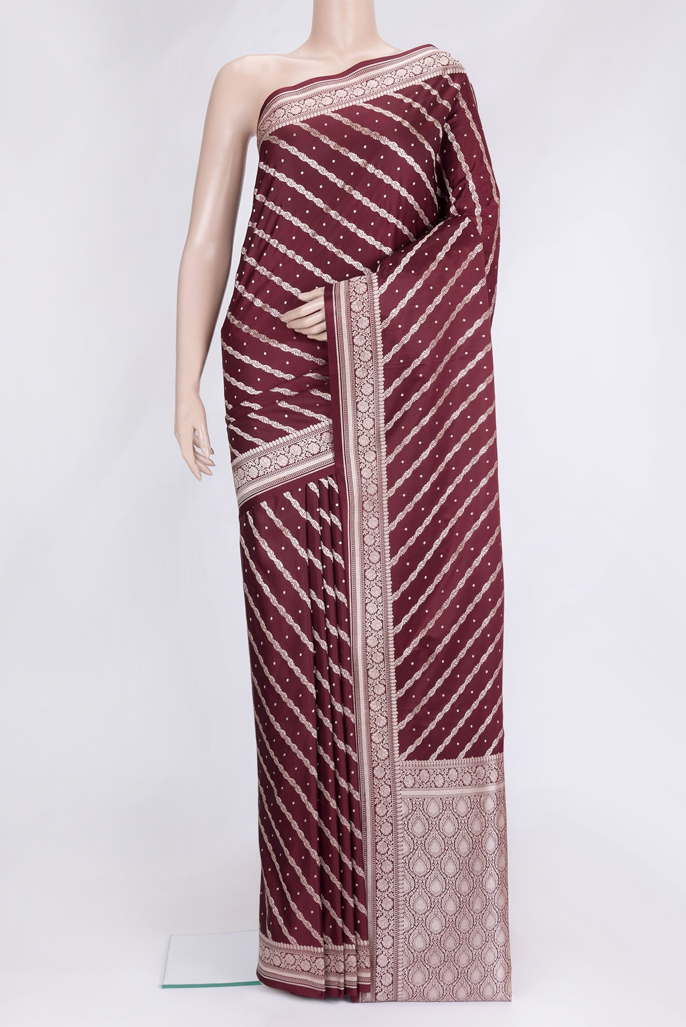 Maroon Dual Tone Blended Banarasi Silk Saree with Zari Brocade on the body and Zari Border.  displayed on a mannequin