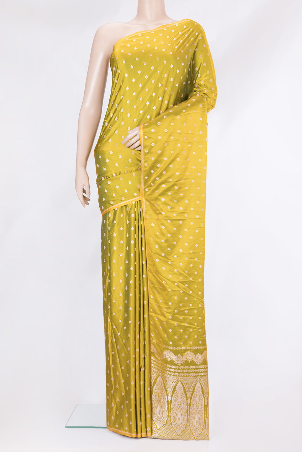 Mehandi Green Blended Banarasi Silk Saree with Zari Butta on the body and Zari Border.  displayed on a mannequin