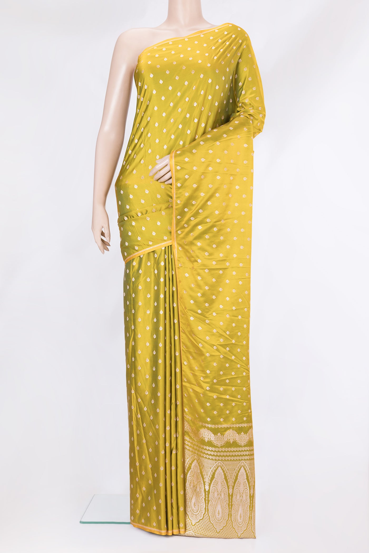 Mehandi Green Blended Banarasi Silk Saree with Zari Butta on the body and Zari Border.  displayed on a mannequin