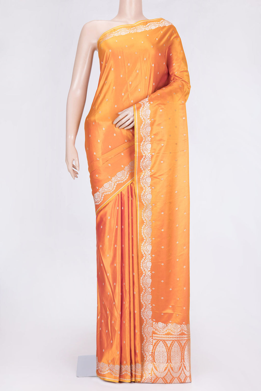 Orange Dual Tone Blended Banarasi Saree with Zari Butta on the body and Zari Border.  displayed on a mannequin