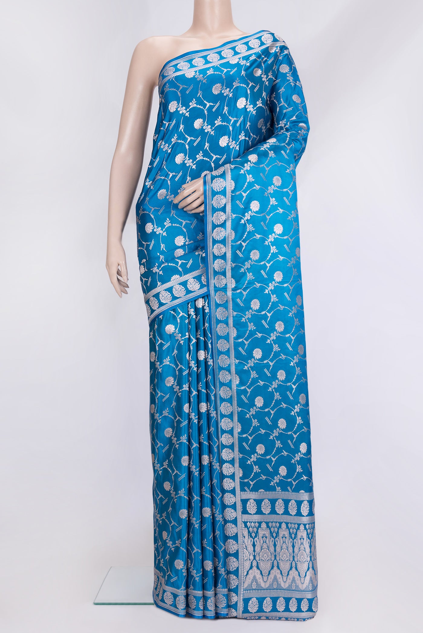 Sky Blue Dual Tone Blended Banarasi Silk Saree with Zari Brocade on the body and Zari Border.  displayed on a mannequin