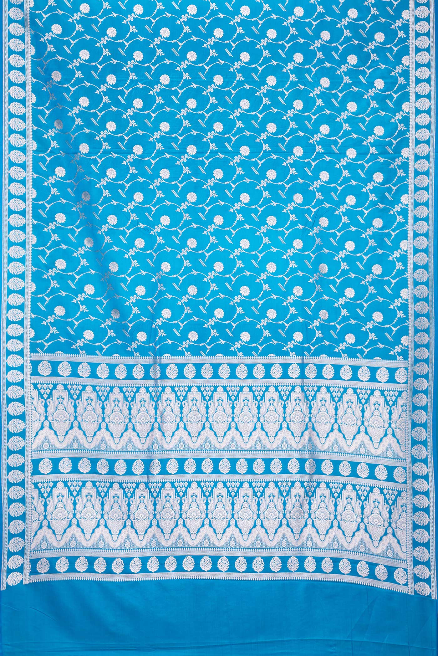Flat view of Sky Blue Dual Tone Blended Banarasi Silk Saree with Zari Brocade on the body and Zari Border. 