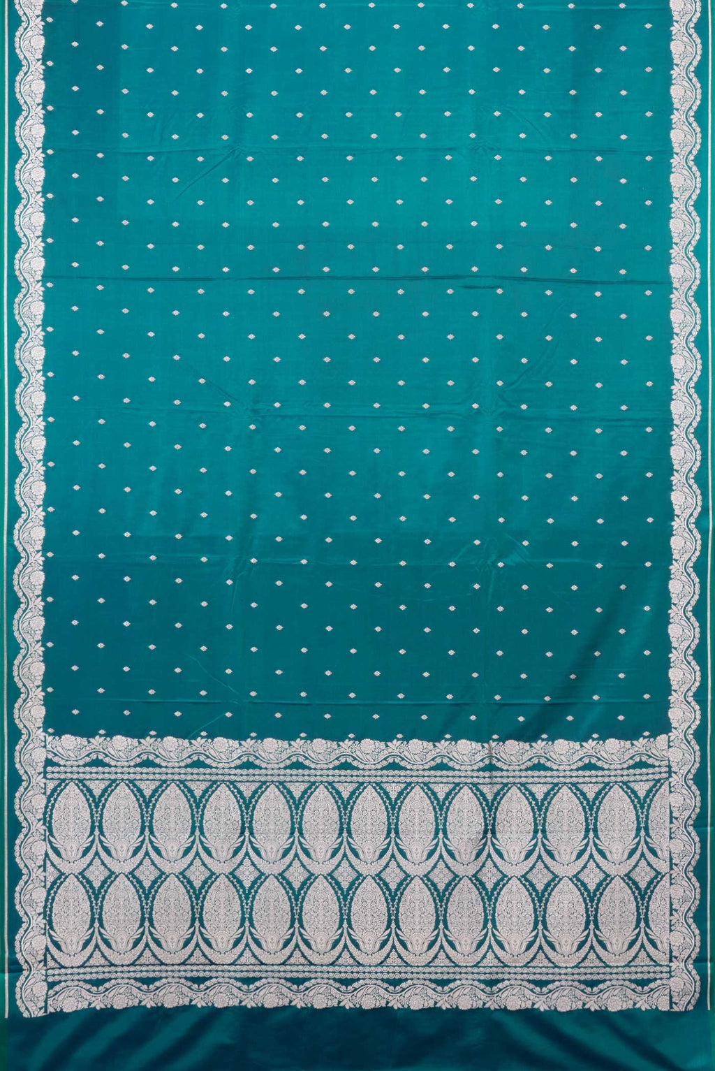 Flat view of Peacock Blue Dual Tone Blended Banarasi Saree with Zari Butta on the body and Zari Border. 