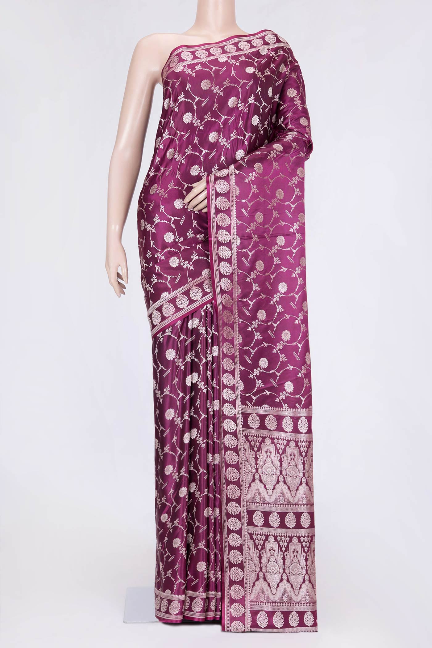 Magenta Dual Tone Blended Banarasi Saree with Zari Brocade on the body and Zari Border.  displayed on a mannequin