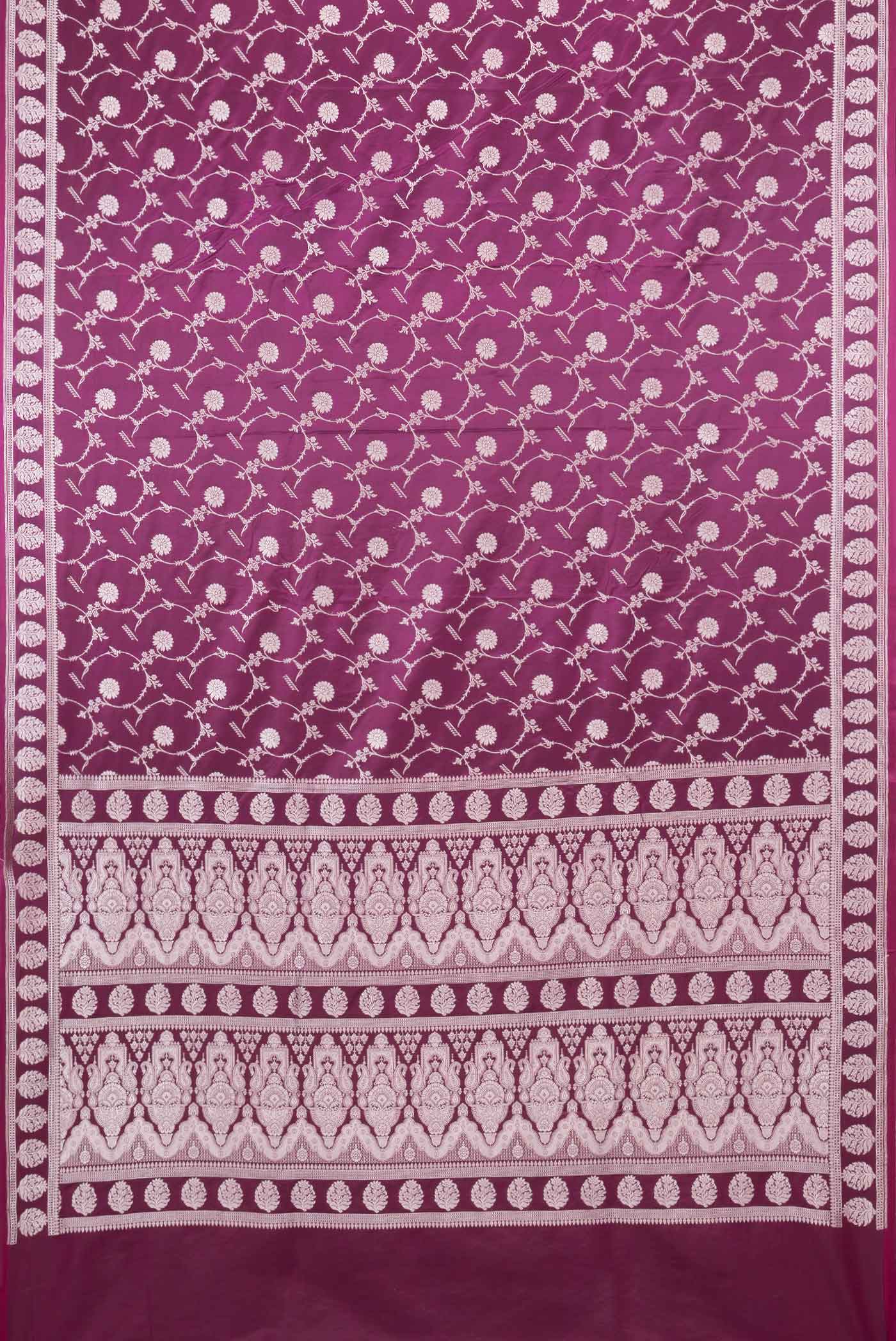 Flat view of Magenta Dual Tone Blended Banarasi Saree with Zari Brocade on the body and Zari Border. 
