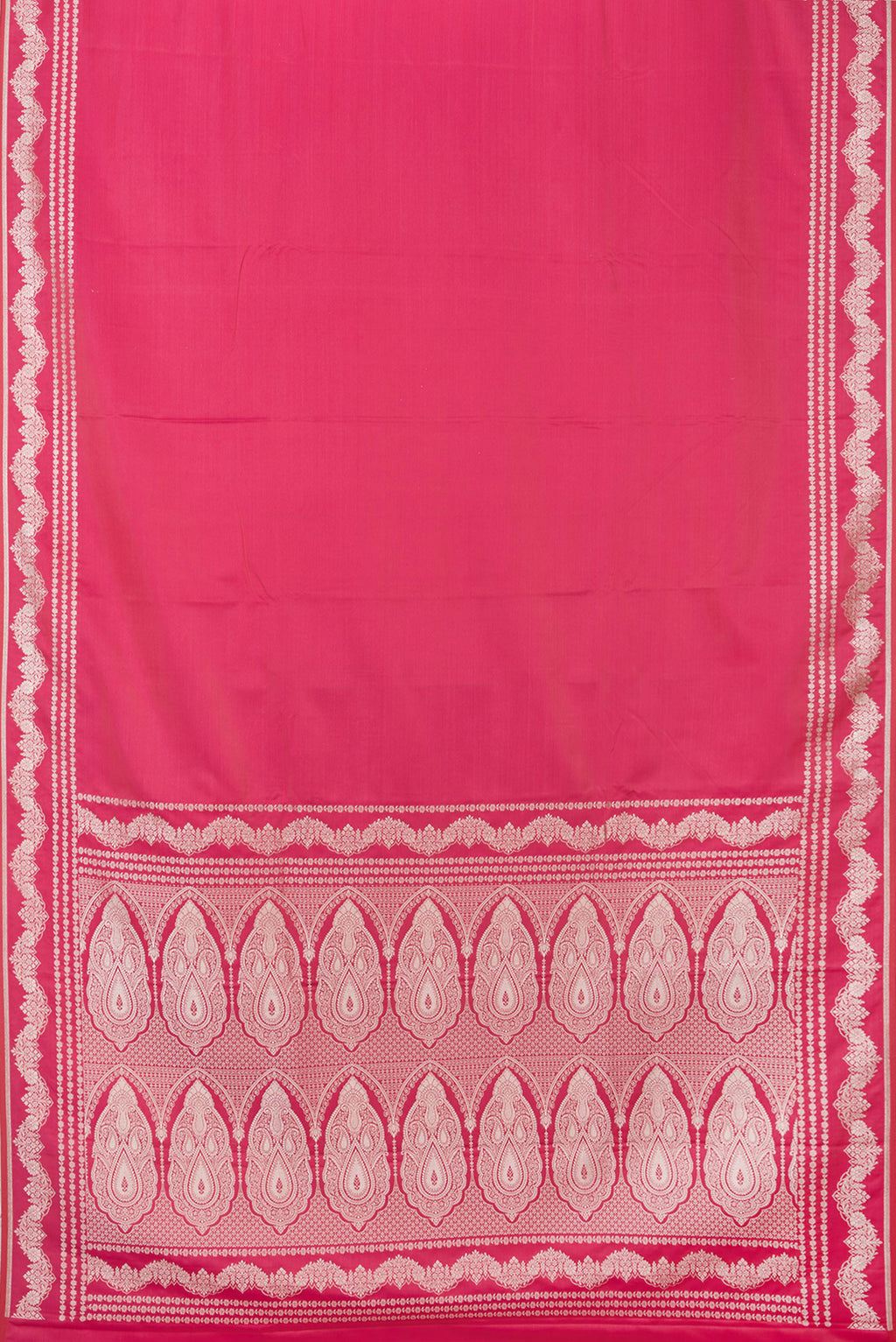 Flat view of Pink Blended Banarasi Silk Saree with Plain Body and Fancy Border. 