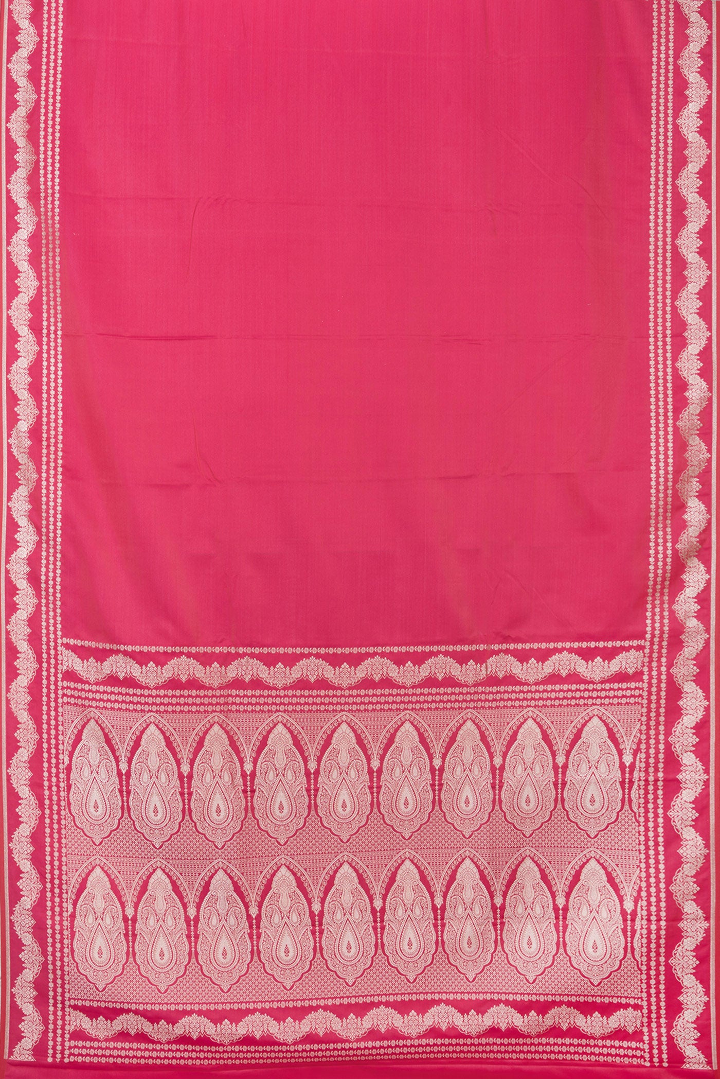 Flat view of Pink Blended Banarasi Silk Saree with Plain Body and Fancy Border. 