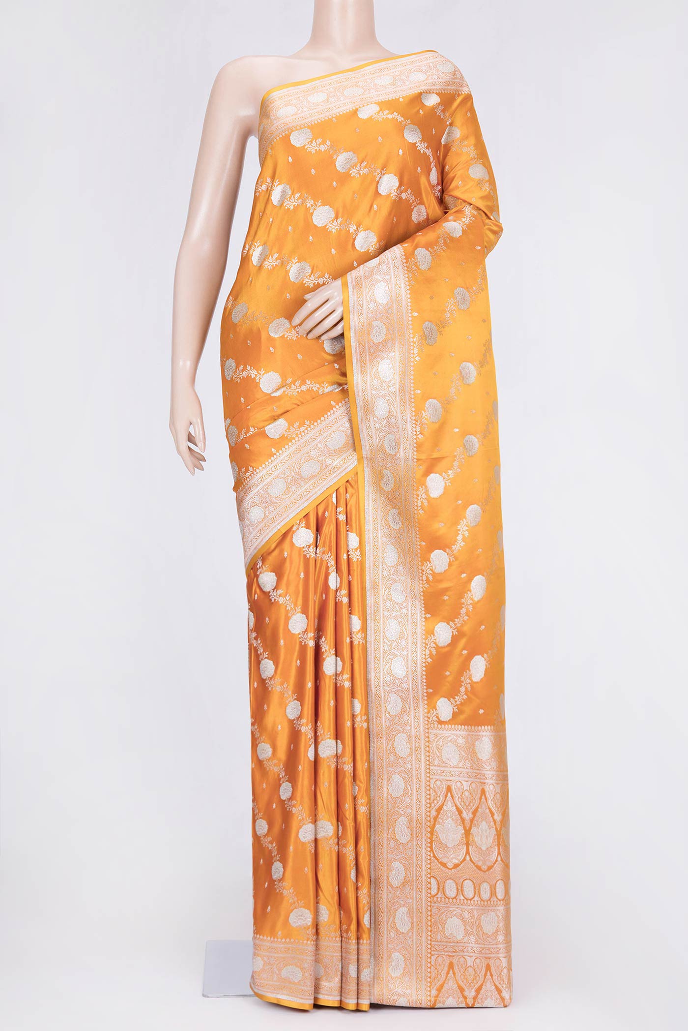 Yellow Dual Tone Blended Banarasi Saree with Zari Brocade on the body and Zari Border.  displayed on a mannequin