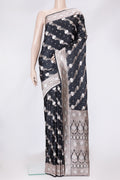 Black Dual Tone Banarasi Silk Saree with Zari Butta on the body and Fancy Border.  displayed on a mannequin