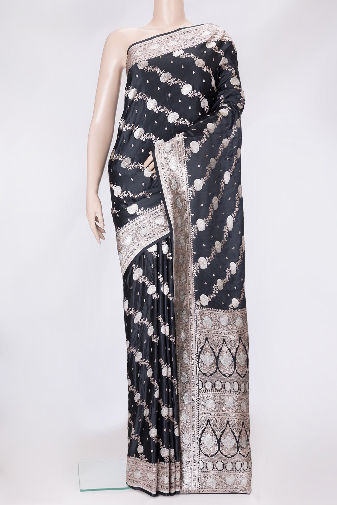 Black Dual Tone Banarasi Silk Saree with Zari Butta on the body and Fancy Border.  displayed on a mannequin