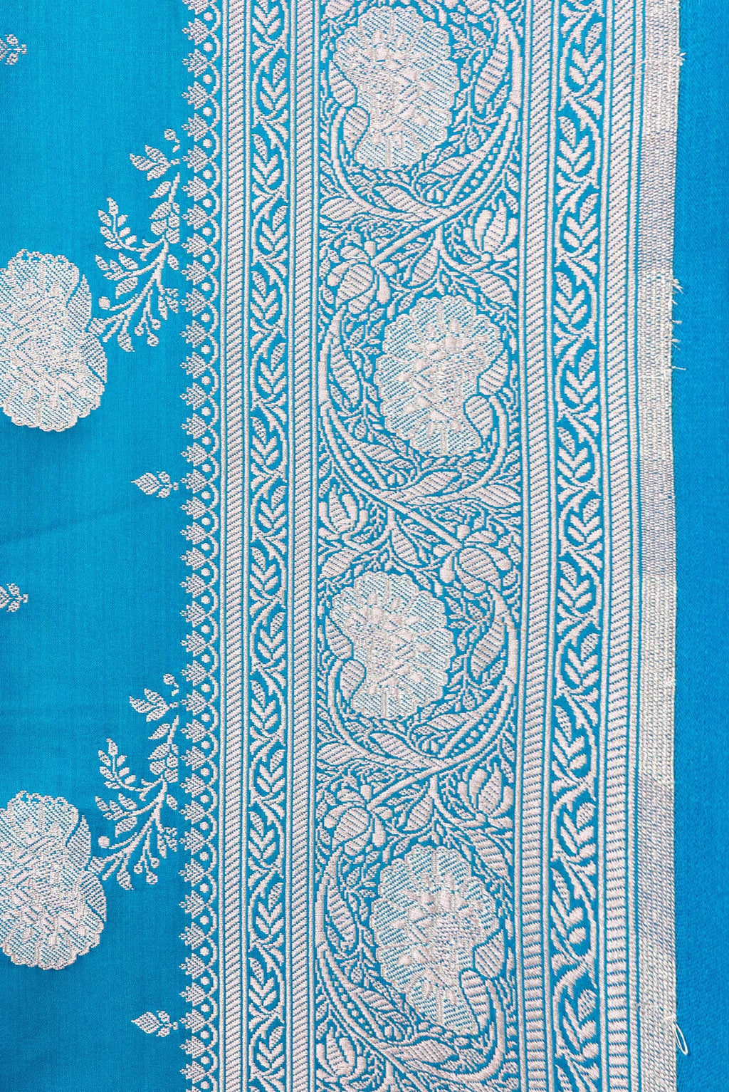 Border image of Sky Blue Dual Tone Blended Banarasi Silk Saree with Zari Brocade on the body and Zari Border. 