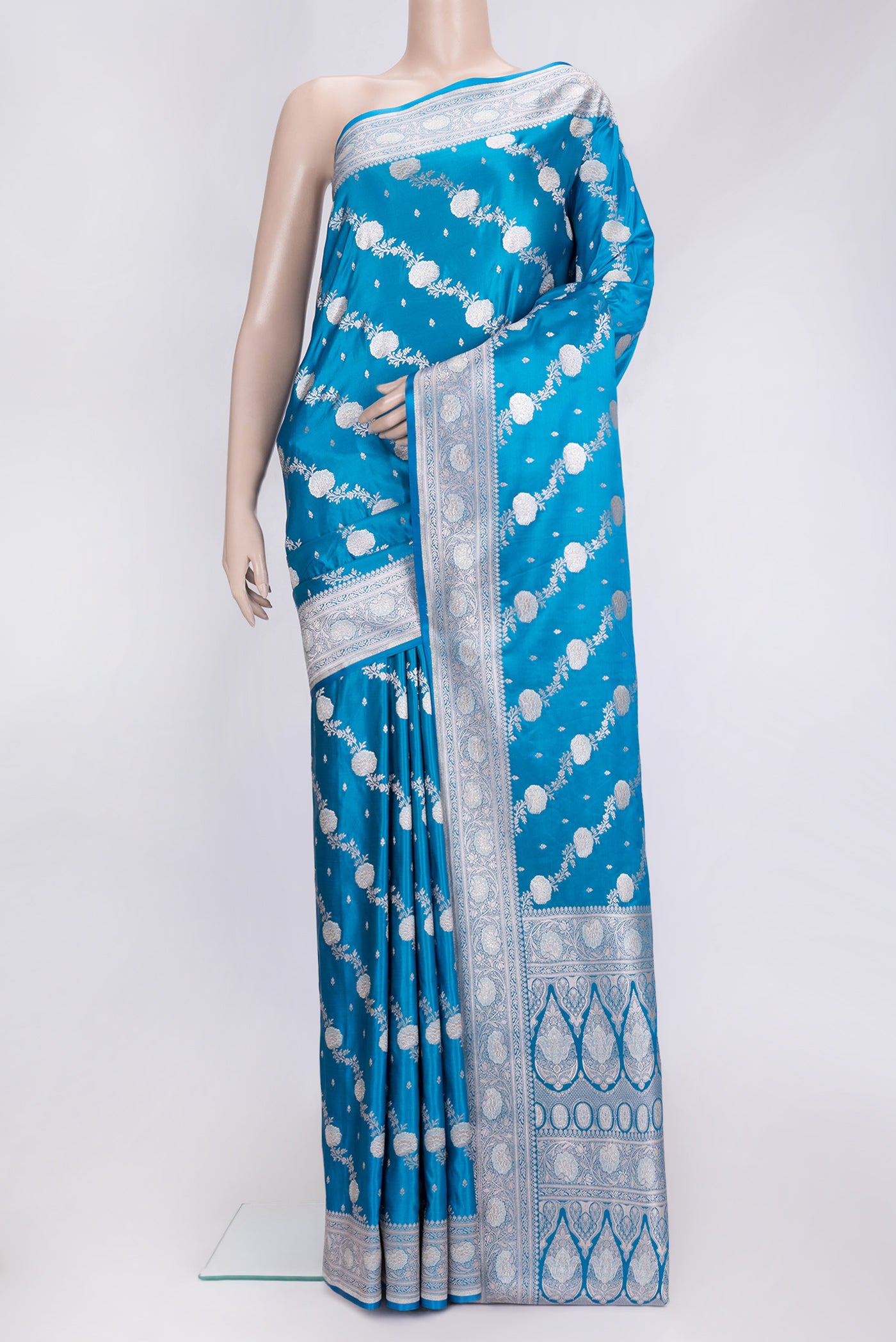 Sky Blue Dual Tone Blended Banarasi Silk Saree with Zari Brocade on the body and Zari Border.  displayed on a mannequin
