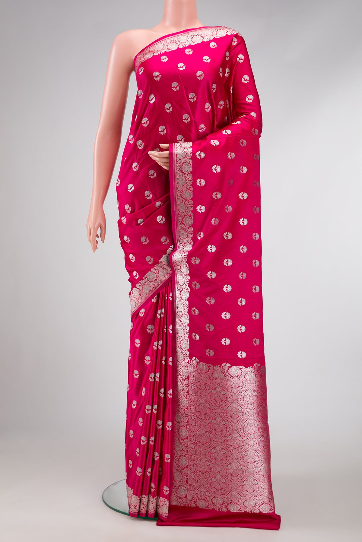 Dark Pink Dual Tone Blended Banarasi Silk Saree with Zari Butta on the body and Zari Border.  displayed on a mannequin