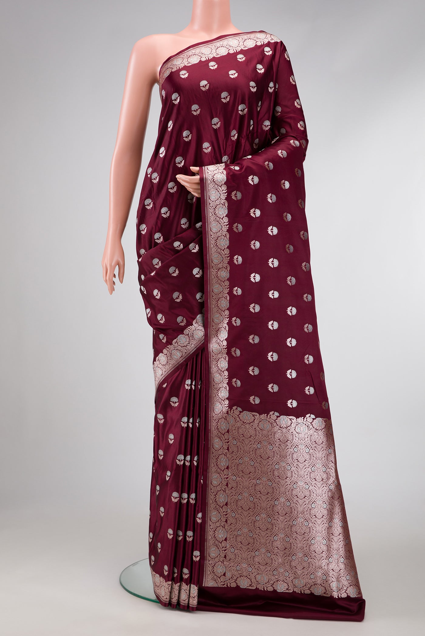 Coffee Brown Dual Tone Blended Banarasi Silk Saree with Zari Butta on the body and Zari Border.  displayed on a mannequin