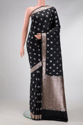 Black Dual Tone Blended Banarasi Silk Saree with Zari Butta on the body and Zari Border.  displayed on a mannequin