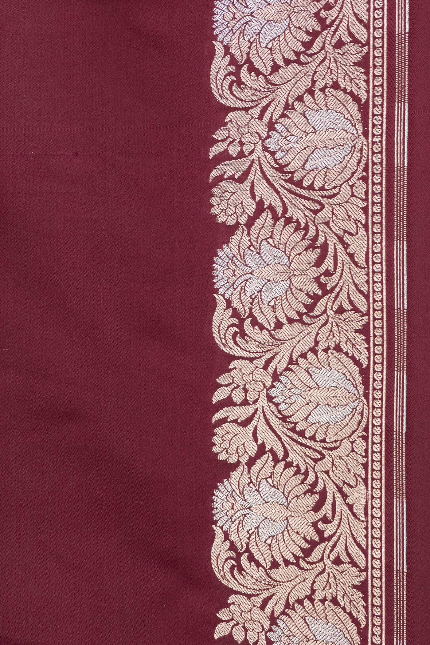 Border image of Maroon Dual Tone Blended Banarasi Silk Saree with Plain Body and Zari Border. 