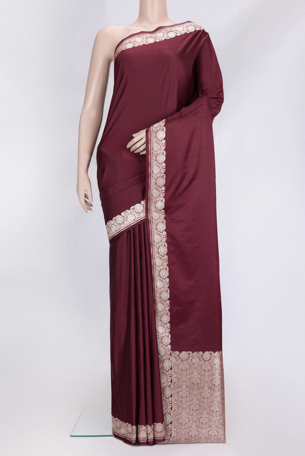 Maroon Dual Tone Blended Banarasi Silk Saree with Plain Body and Zari Border.  displayed on a mannequin