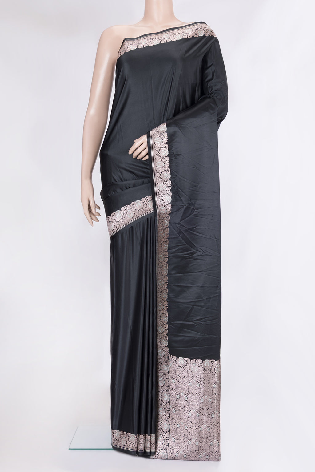 Black Blended Banarasi Silk Saree with Plain Body and Zari Border.  displayed on a mannequin