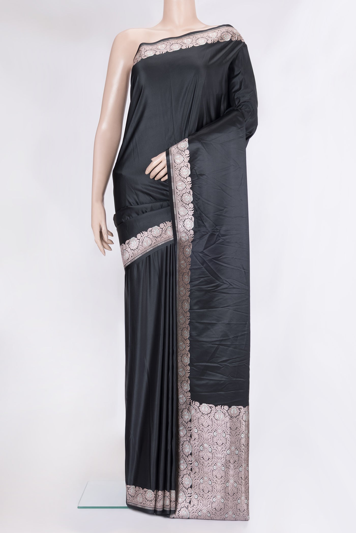 Black Blended Banarasi Silk Saree with Plain Body and Zari Border.  displayed on a mannequin